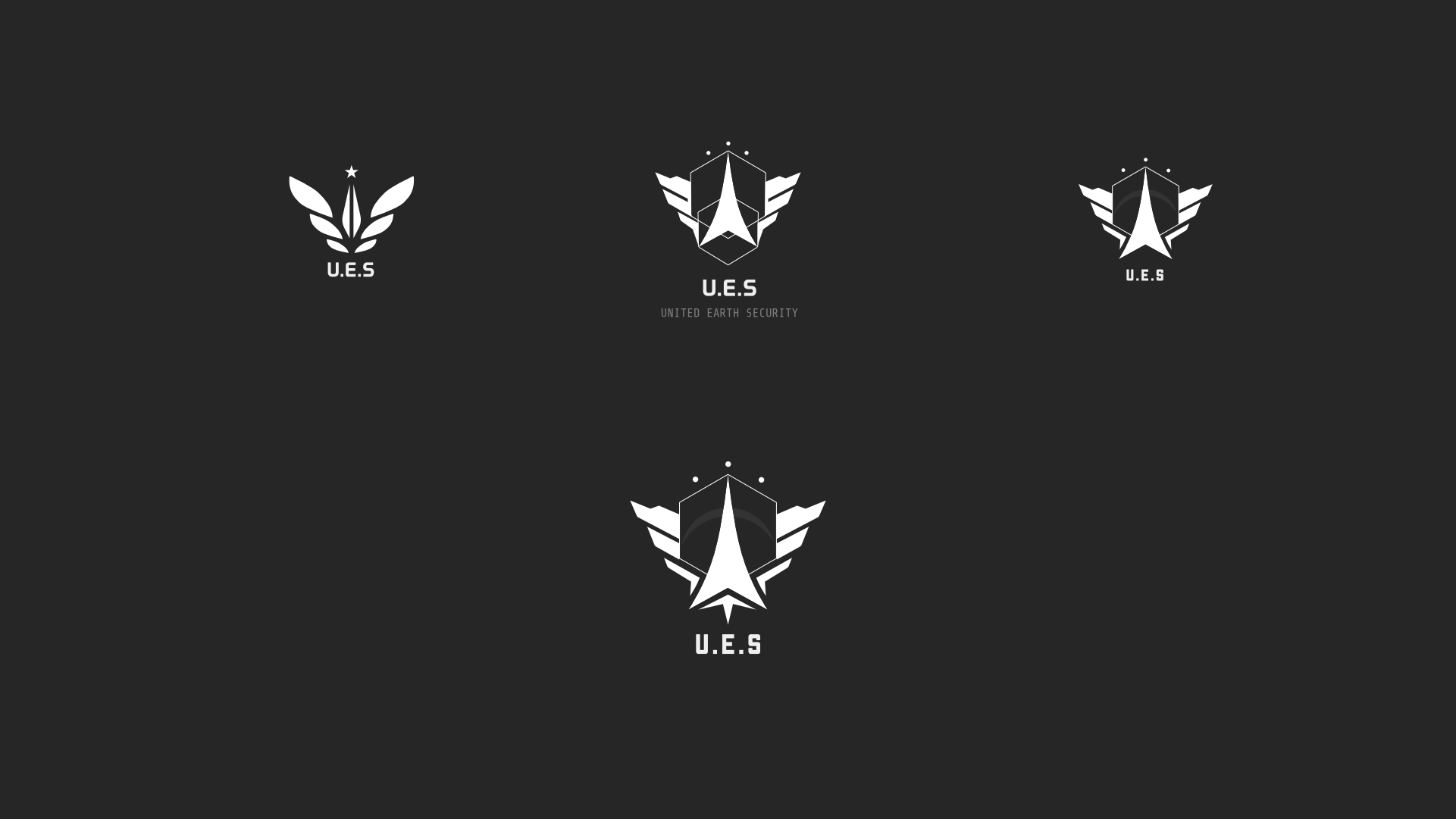 Refined U.E.S. logo variations with arrow, hexagon, and wing motifs